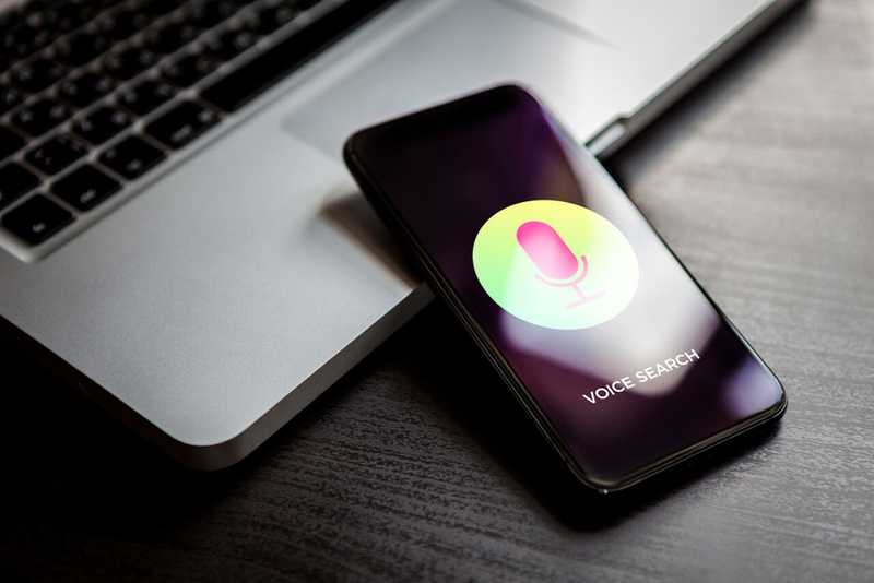 man holding a tablet that says email marketing